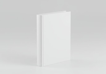 Blank white hardcover book standing upright on a white surface, isolated on white