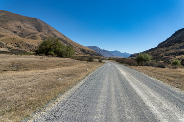 Surrounded by mountain ranges the extreme arid dry farming fields in the Ahuriri conservation valley area  in Canterbury NZ