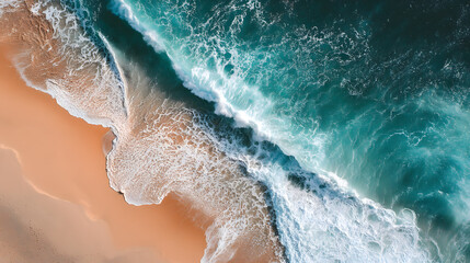 Aerial view of sandy beach and ocean with waves