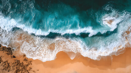 Aerial view of sandy beach and ocean with waves
