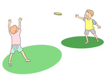 フリスビーで遊ぶ子供たち