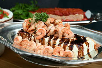 shrimp terrine with tare sauce, shrimp terrine, buffet food in restaurant, haute cuisine, close up of terrine
