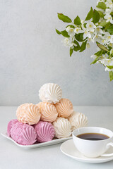 Assorted marshmallows for breakfast with a cup of fragrant coffee