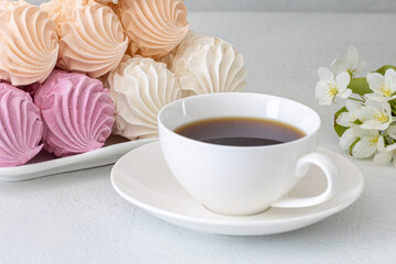 Assorted marshmallows for breakfast with a cup of fragrant coffee