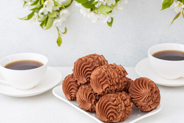 Coffee marshmallows for breakfast with a cup of fragrant coffee