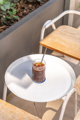 Iced Black Coffee On White Table