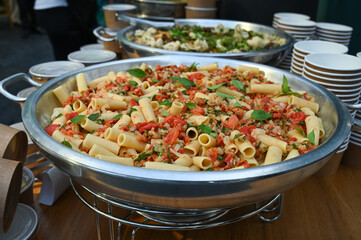 food in the restaurant, close up of pasta, spring folder, pasta with tomato and basil, table with food

