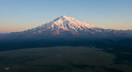 Fototapeta premium Majestic Mount Denali at Dawn: A Breathtaking Aerial View of Alaska's Highest Peak