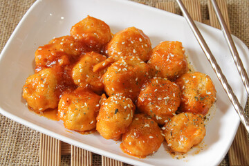 Turkey meatballs in tomato sauce on a plate. Meatballs with spicy sour sauce