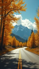 Naklejka premium Winding Road Through Golden Autumn Forest Landscape Towards Distant Mountains