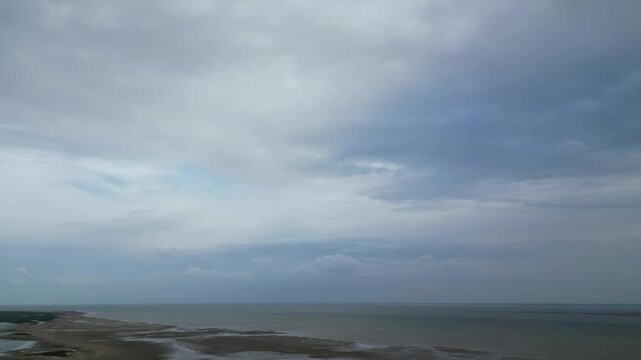 Beach and Ocean Sea Side at Point Clear Village in Civil Parish of Saint Osyth, County of Essex, England, United Kingdom During Windy and Cloudy Day