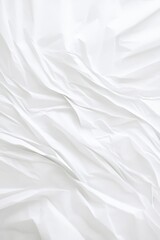 Fototapeta premium Crumpled white paper texture background, showcasing folds and wrinkles in a soft light setting.