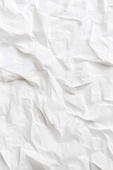 Obraz premium Close-up of a crumpled white paper texture with shadows and highlights.