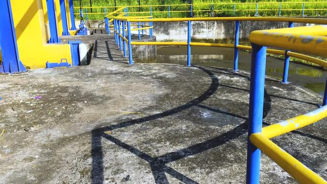 Old Dam Structure on a Stream Surrounded by Forest
