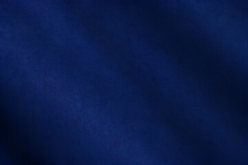 Abstract dark blue background. Silk satin. Navy blue color. Elegant background with space for design. Soft wavy folds.