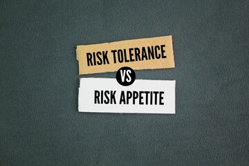 boxed paper with the words risk tolerance vs risk appetite. Risk appetite is the amount of risk an...