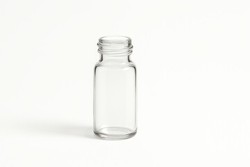 A clear glass bottle isolated on a white background. Perfect for showcasing your product design or packaging ideas. Ideal for food photography and minimalist design aesthetics.