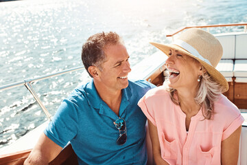 Happy, couple and yacht with laugh, love and celebration or marriage anniversary with travel on...