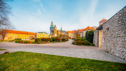 Wawel castle landmark with city view near river in Krakow Poland. Autumn landscape on coast river Wisla.