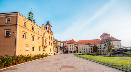 Wawel castle landmark with city view near river in Krakow Poland. Autumn landscape on coast river Wisla.