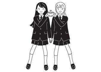 指でハートマークを作るポーズの女子学生