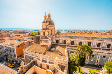 Fototapeta premium View fom Chiesa della Badia di Sant'Agata on Cathedral Sant Agata on Piazza del Duomo with Elephant Fountain. in Catania, Sicily, Italy.