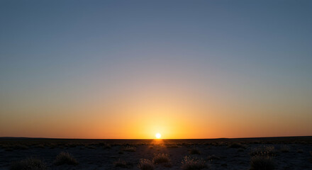 Fototapeta premium Breathtaking Sunset Over Expansive Desert Landscape at Dusk