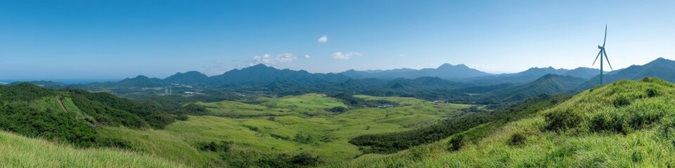 Naklejka premium Panorama of wind turbines in green hills against a blue sky landscape photography wide angle view scenic environment