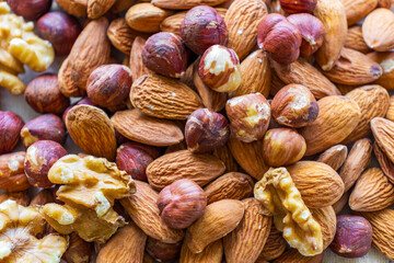 Mix of nuts as a background. Top view. 