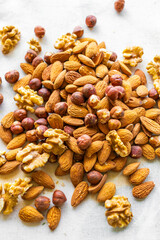 Mix of nuts as a background. Top view. 