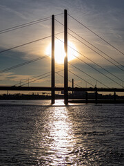 Fototapeta premium Bridge on Rhine with interesting sky on sunset
