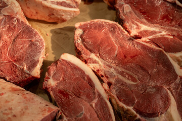Raw prime steaks. Variety of fresh black angus prime meat steaks T-bone, New York, Ribeye,...