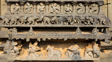 Ancient carvings of dancers, musicians, and elephants on Shri Pachchala Someshwara Temple, Panagallu, Nalgonda, Telangana, India.