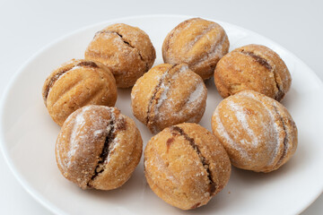 Sweet baked nuts with condensed milk filling.