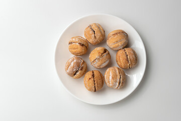 Sweet baked nuts with condensed milk filling.