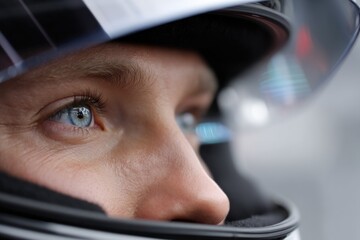 Intense focus captured in close-up of driver's eyes, showcasing