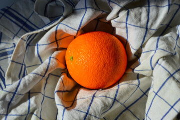 Fresh orange soft kitchen towel natural light Cozy slow living healthy eating sustainable lifestyle...