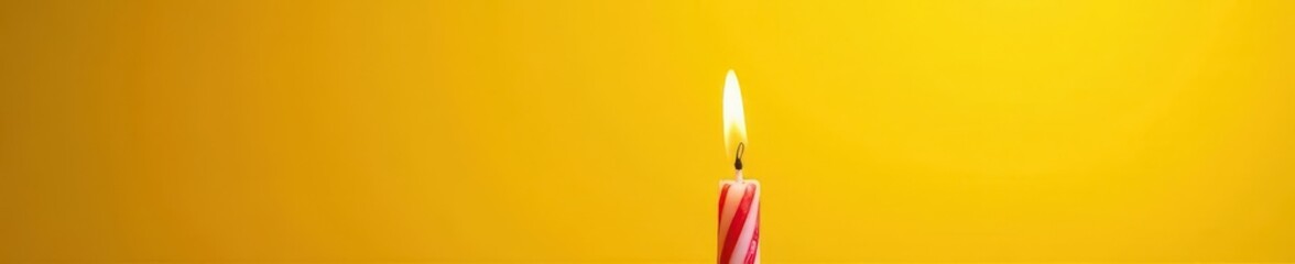Birthday candles ablaze, vibrant yellow backdrop, vibrant, candlelight, candles