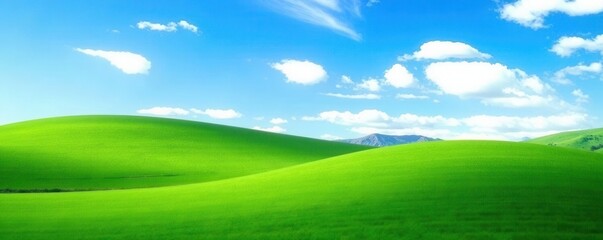 Obraz premium Rolling hills of emerald green against a clear azure sky , photography, rural