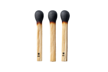 Group of burnt matchsticks with charred tips isolated on transparent background
