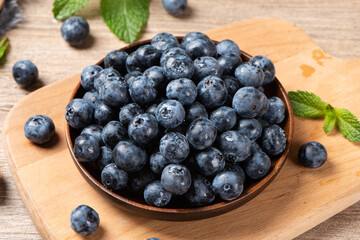 fresh blueberry fruit on woooden table.