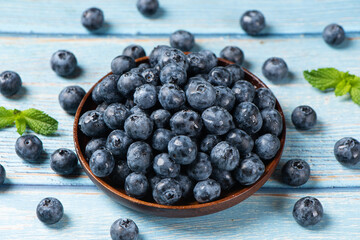 fresh blueberry fruit on woooden table.