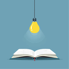 Book illuminated by hanging lightbulb