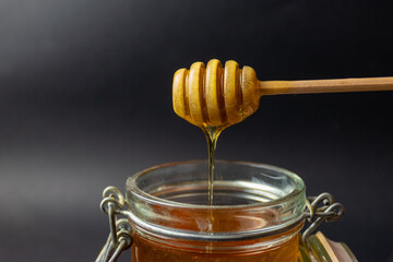 Honey and honey dipper