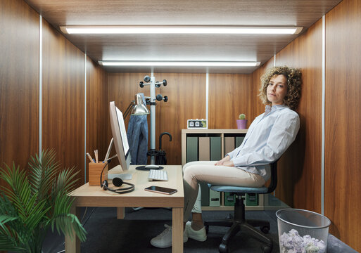Portrait of a businesswoman working in a small minimalist office