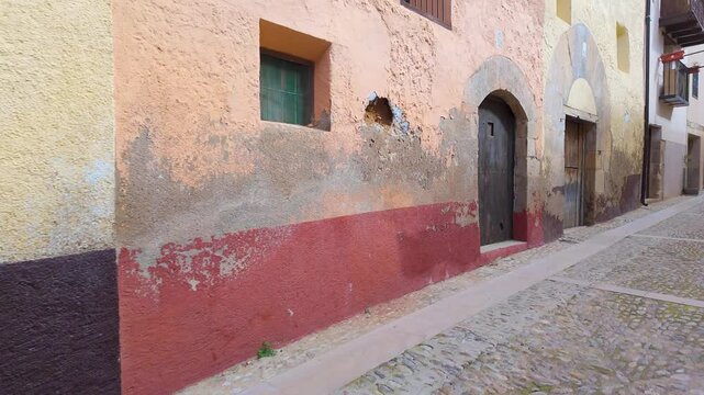 Picturesque colourful facades in the streets of the medieval village of Beceite, Matarrana, Teruel.