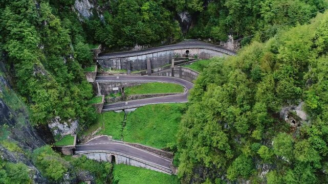 Dramatic overhead shot of steep switchbacks on historic San Boldo pass, Italy