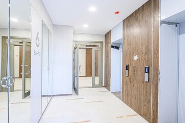 interior apartment public place, house entrance. doors, walls, staircase corridors