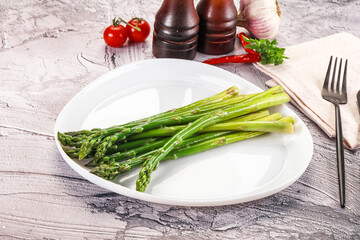 Vegan cuisine - Boiled asparagus with oil