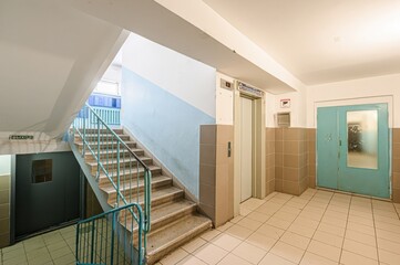 interior apartment public place, house entrance. doors, walls, staircase corridors. staircase in a...